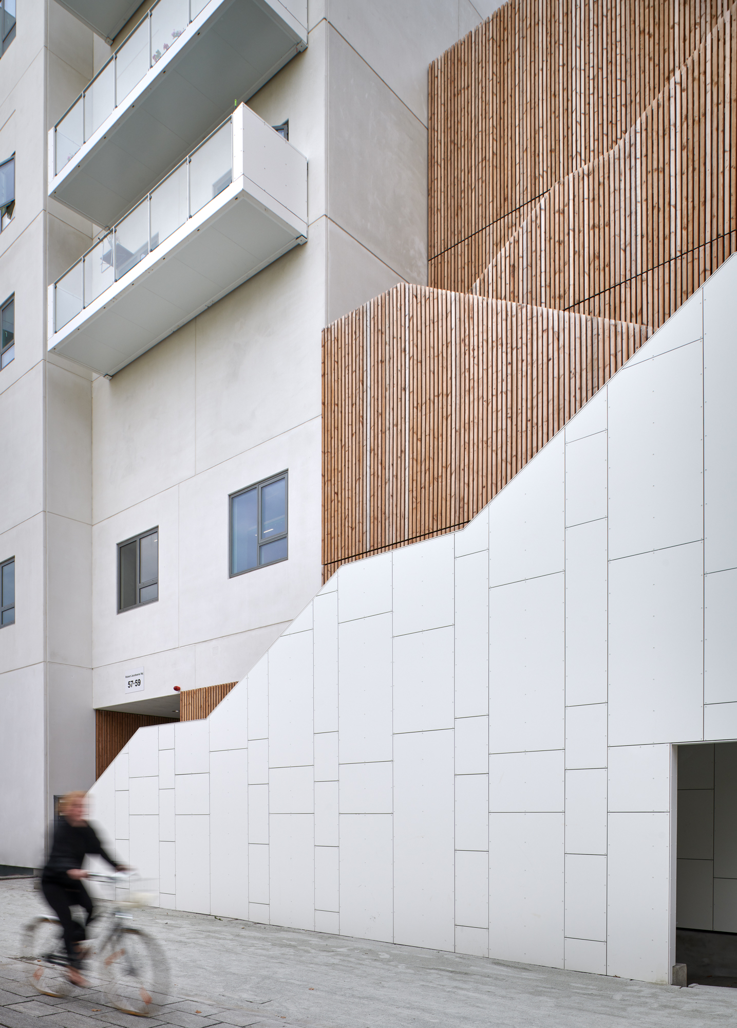 Person on bike in a new housing area