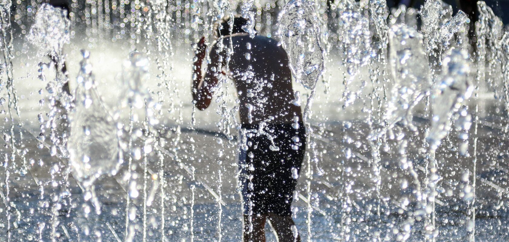 Illustration of man cooling off in heatwave