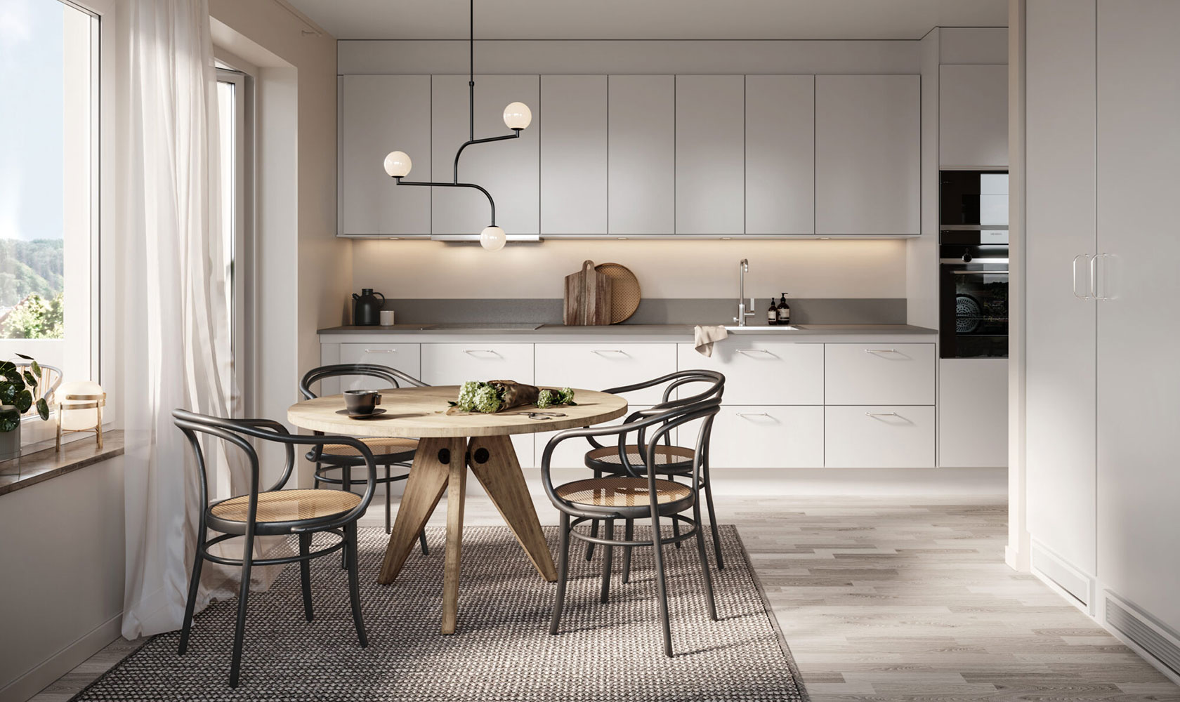 Visualisation of a kitchen with beige cupboard doors and a dining table with light wood chairs in front.