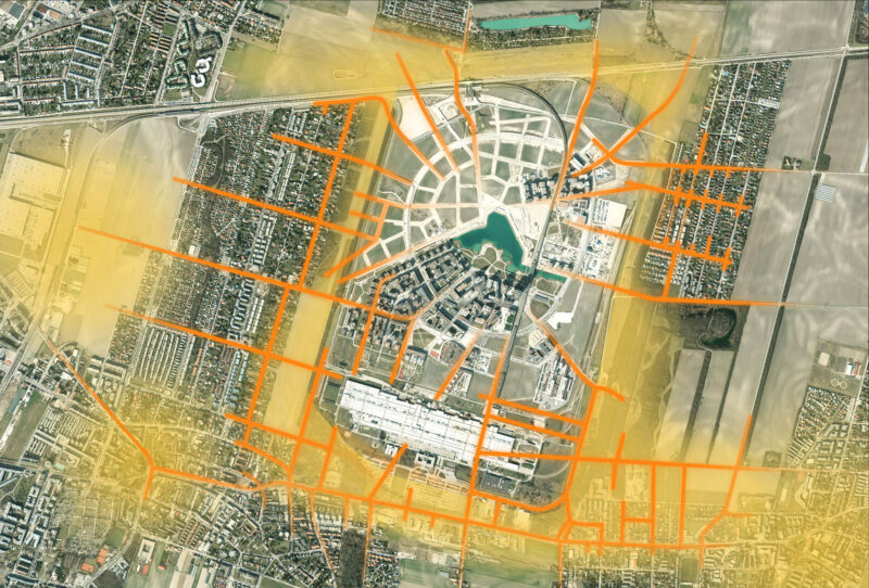 Aerial view of city layout with orange lines highlighting roads and pathways around buildings and lake.