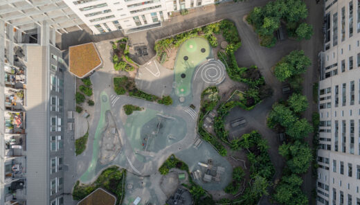 View from above of a yard with an exciting playground with lots of greenery.