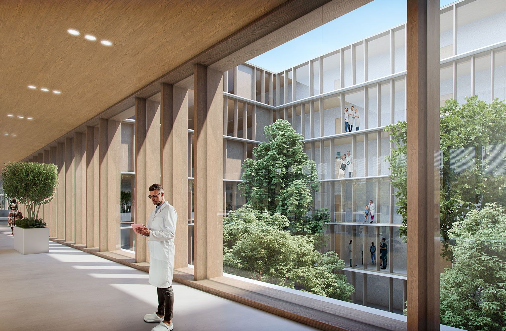 Visualization of a hospital-attired person in an open area on a floor in the hospital building with large windows facing a green inner courtyard.