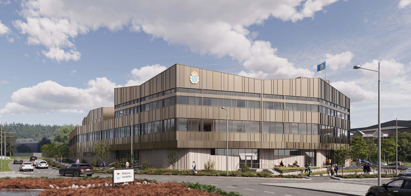 Modern police office building with beige panels, surrounded by cars and pedestrians, under a blue cloudy sky.