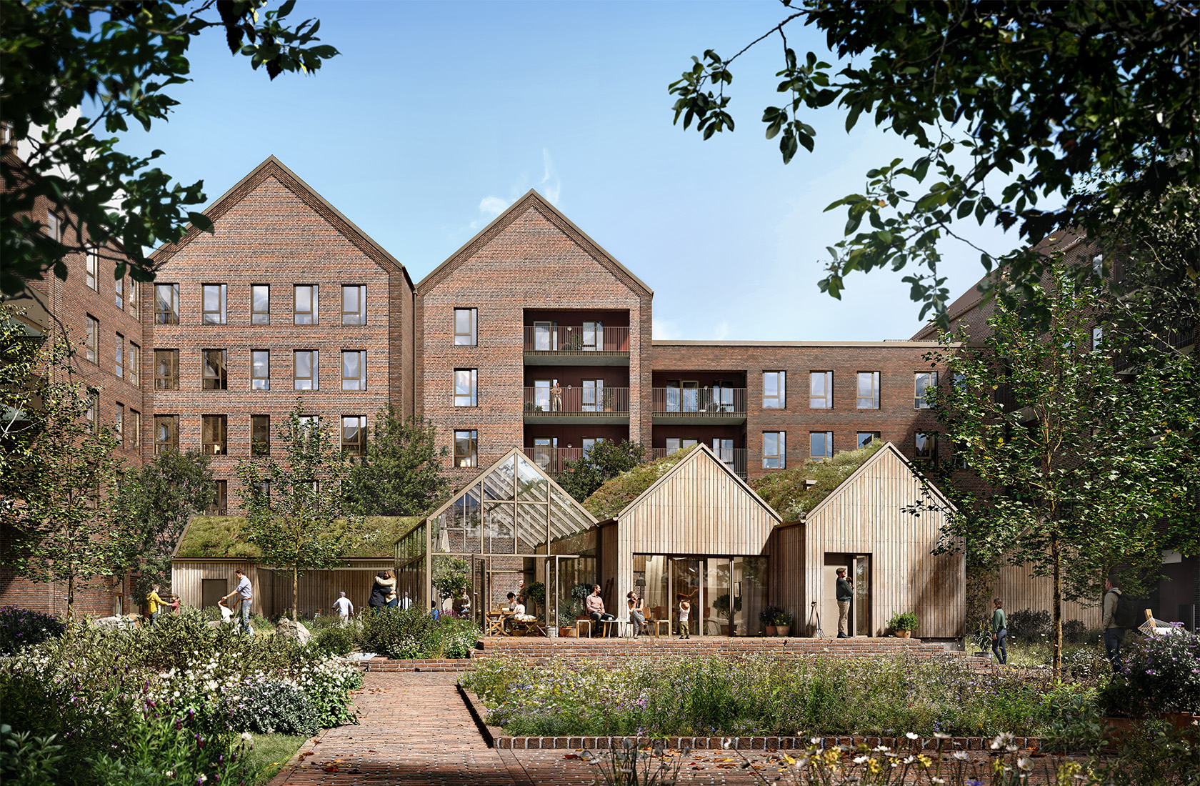 Modern apartment buildings with large windows and a communal garden area in front.