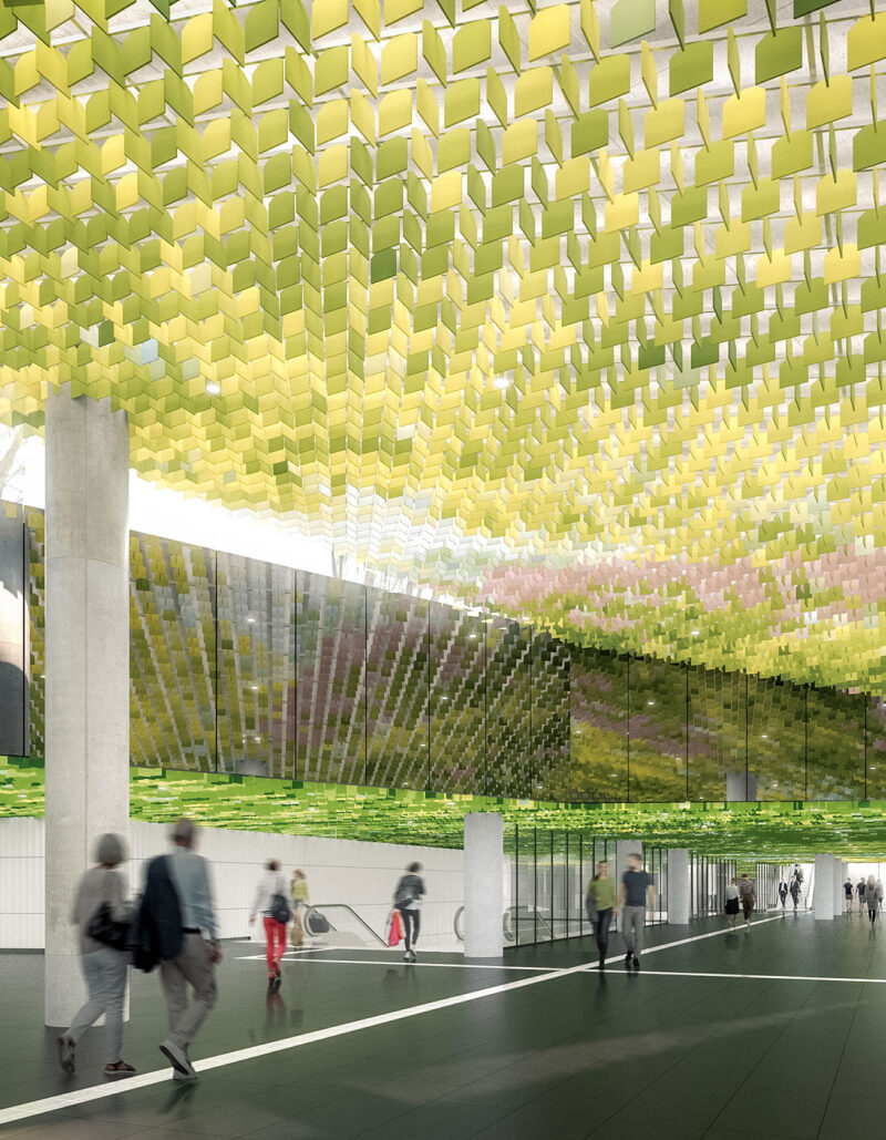 Modern subway station hallway with decorative ceiling, escalators, and people walking.