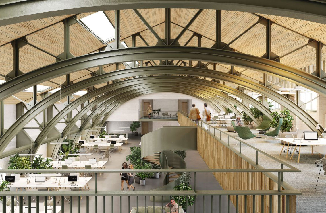 Modern open-plan office with arched steel roof, mezzanine walkway, and indoor plants