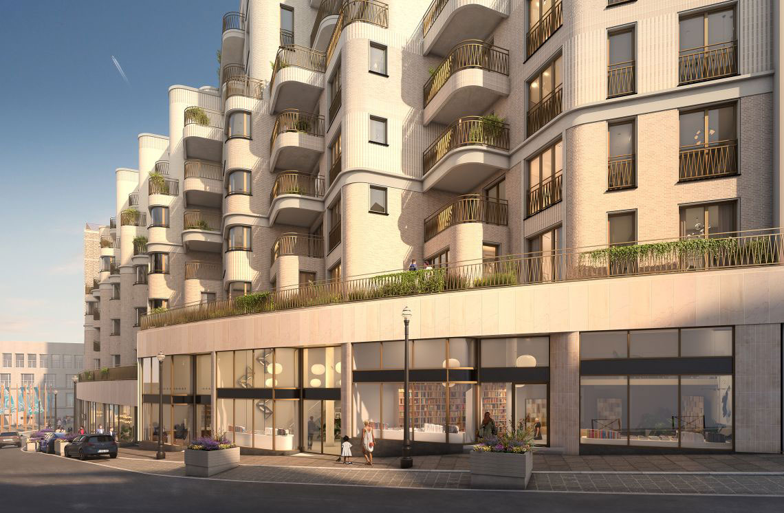 Modern apartment building with curved balconies and street-level shops in city street